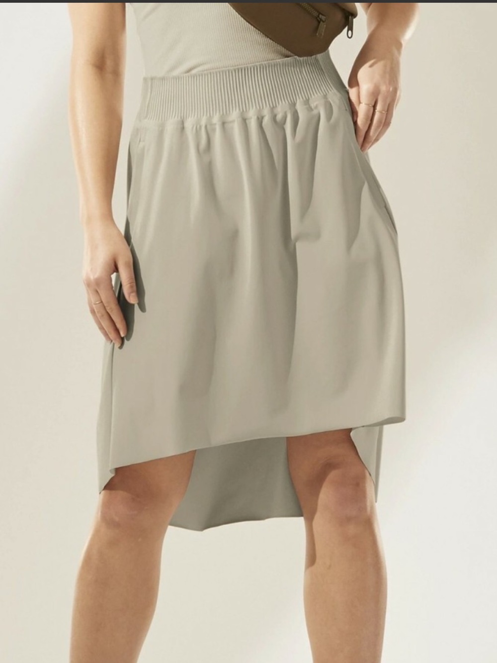 Athleta Cosmic Skirt Size Medium beige neutral hi low moisture wicking active